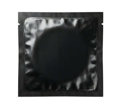 Black metallic condom foil packet with square sealed edges for contraception safe intimacy and protection isolated on a transparent background