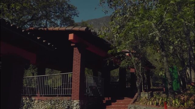 Modern rustic house with brick facade and metal gate