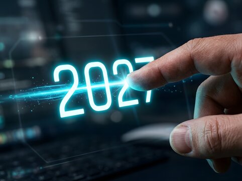 Futuristic interface with the year 2027 glowing in bright cyan numbers as a persons finger points towards it