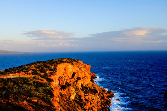Cape Sounion At Sunset With Aegean Sea And Cliffs