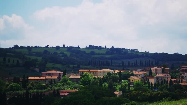 Establishing aerial view of a picturesque village in Tuscany, Italy