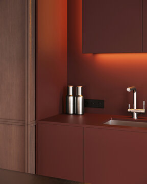 Modern minimalist kitchen with deep burgundy cabinetry, integrated sink, metallic accessories, warm lighting, and wood wall panels in a sophisticated interior.