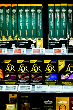  Supermarket Shelf Display Of Branded Premium Coffee Pods With Visible Price Tags During Food Inflation