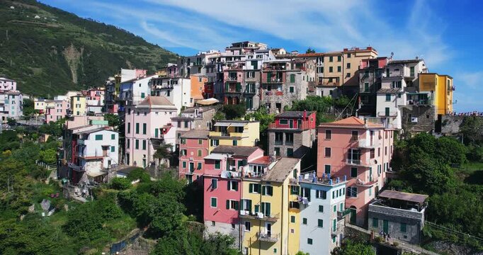 Scenic Hillside Townscape of Corniglia in Cinque Terre, Italy, aerial drone panoramic view