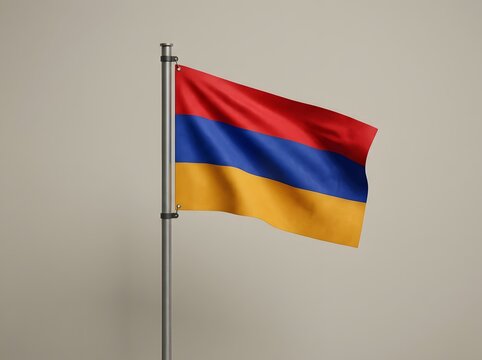 Waving flag of armenia on a flagpole against a neutral background