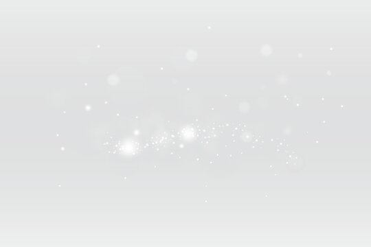 White glowing bokeh particles with sparkling light dust and soft luminous effect