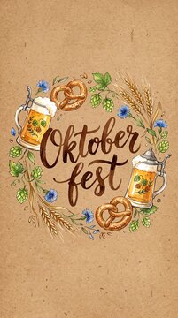 Oktoberfest calligraphy lettering with beer mugs pretzels hops and wheat on kraft paper. Watercolor illustration in circular composition.