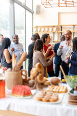 Vibrant social gathering with food