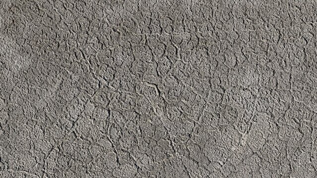 Aerial view of the dry, cracked earth of Little Gaynor Lake bed, showing intricate patterns of parched soil and textures in Longmont, Colorado, United States.