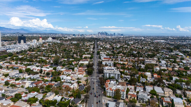 Aerial view of the intersection of South San Vicente Boulevard and South Fairfax Avenue surrounded by residential neighborhoods in Los Angeles, California, United States.