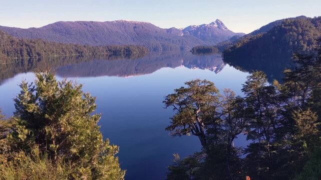 Calm Glacial Lake and Forested Andes Mountains in Patagonia Argentina