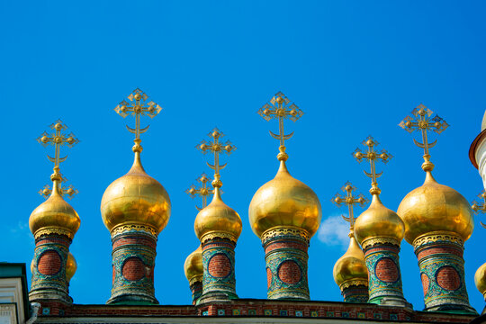 Golden Onion Domes and Crosses of Terem Palace Upper Savior Cathedral in Moscow Kremlin Russia