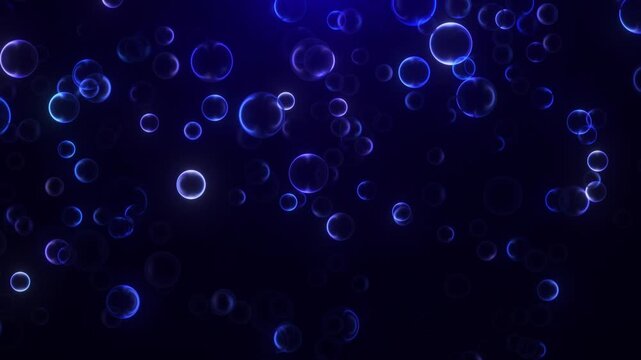 Abstract blue glowing bubbles floating through a dark deep blue background. Soft transparent spheres create an underwater atmosphere with smooth motion, depth, and luminous highlights. Ideal for aquat