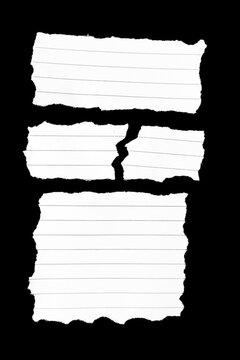 Set of torn pieces of blank lined notebook paper separated by gaps against a solid black background.