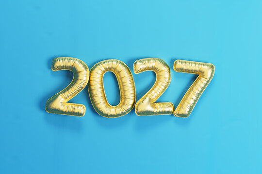 3D Golden 2027 Numbers on Bright Blue Background