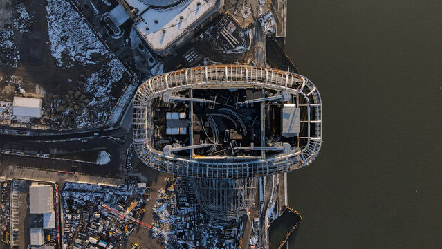 Aerial view of the Kula Beograd Waterfront construction site with steel framework and surrounding urban development along the riverbank in Belgrade, City of Belgrade, Serbia.