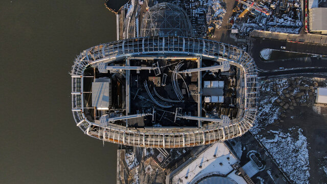 Aerial view of Kula Beograd Waterfront construction site, showing structural framework, cranes, and snowy terrain near the Sava River in Belgrade, City of Belgrade, Serbia.
