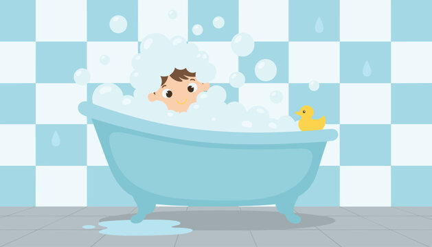 Cute little boy taking a bubble bath in a blue clawfoot tub with a yellow rubber duck in a blue checkered tile bathroom.