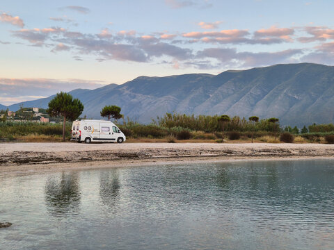Discovering serene landscapes in Orikum, Vlor&euml;, Albania with a cozy camper van