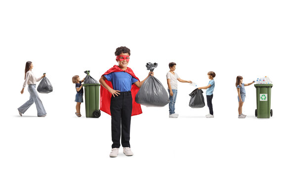 Boy in a superhero costume holding a garbage bag in front of children recycling