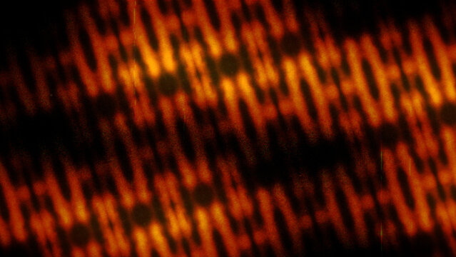 Abstract orange sound wave light pattern with digital glowing equalizer and data motion blur background