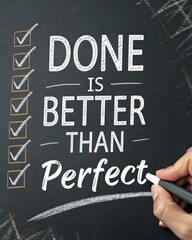 Fototapeta premium Motivational message on a chalkboard emphasizing that completing tasks is more valuable than striving for perfection to foster a productive and successful mindset