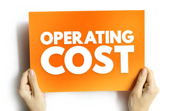 OPERATING COST text on card held by hands. Business expense concept, budgeting, and financial planning message highlighting economic efficiency and profit management