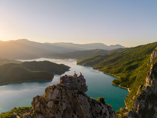 Fototapeta premium Stunning view from the cliffs overlooking Bovilla Reservoir in Albania during sunset