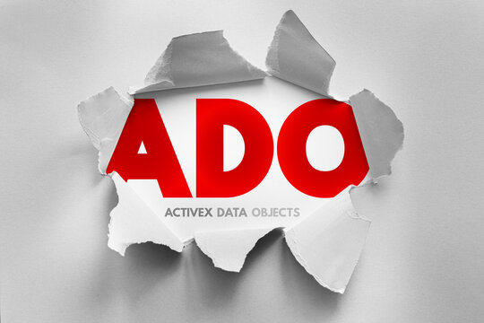 ADO ActiveX Data Objects text revealed through torn paper surface, software development concept representing database access technology for structured data management