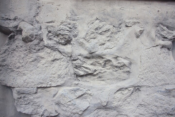 Biała ściana o oryginalnym wzorze tynku strukturalnym. A white wall with a distinctive textured plaster pattern. © 123108 Aneta