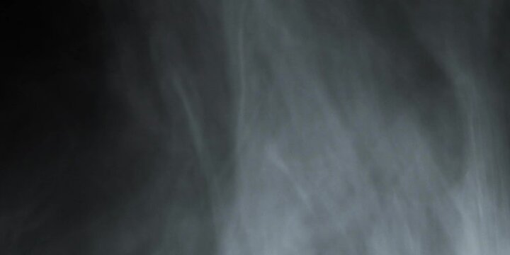 Smoke swirls in the light on the ground. Can be used as a special effect for your projects, video texture or background for designs, scenes, etc. Video in loop.