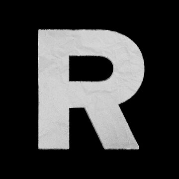 Capital letter R made of textured white paper isolated on black background