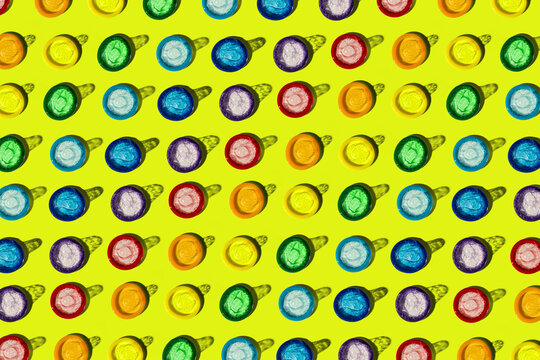 Colorful condom pattern on bright yellow background