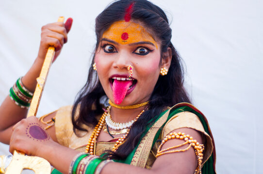 Beautiful young girls dressed as hindu goddes Durga