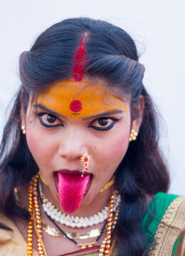 Beautiful young girls dressed as hindu goddes Durga