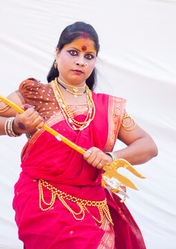 Beautiful young girls dressed as hindu goddes Durga