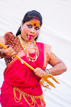 Beautiful young girls dressed as hindu goddes Durga