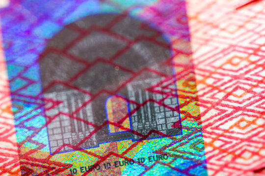Euro currency extreme close up of 10 euro banknote. Detailed European money texture. Selective focus. Shallow depth of field. Extreme macro.