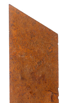 Part of old unknown rusty object isolated on white background. The usual metal detecting find.