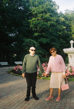 Stylish Senior Couple In The Park