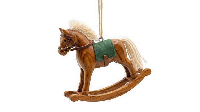 Wooden rocking horse ornament with leather bridle and green saddle isolated on transparent background
