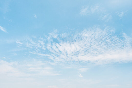 Blue sky with thin white clouds as a weather and travel backdrop