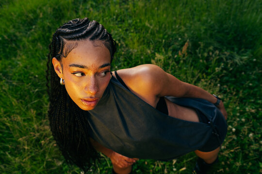 Woman With Braids Looking Up