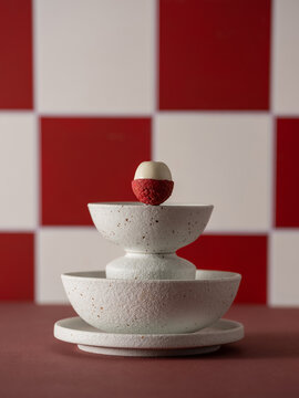 Lychee Dessert Presentation against a red and white