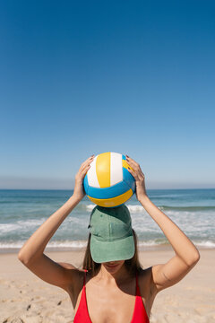Volleyball Balanced Over Cap