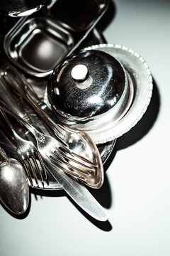 Dining Utensils and Silverware Arranged on a Table