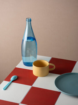 Minimalist Table Setting on a red and white checkered surface