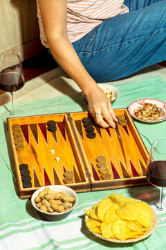 Woman playing backgammon
