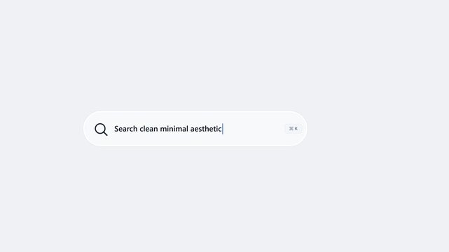 Minimalist web search bar interface for Halloween aesthetic inspiration on a clean white background layout