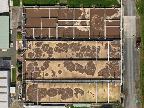 Lilydale, Victoria, Australia - 10 September 2026: Aerial view of the Lilydale Wastewater Treatment Plant, featuring large aeration tanks with bubbling water and industrial infrastructure.